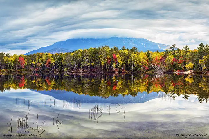 This is an autumn view of Mount Katahdin as seen from Upper Togue Pond in Baxter State Park, Maine.