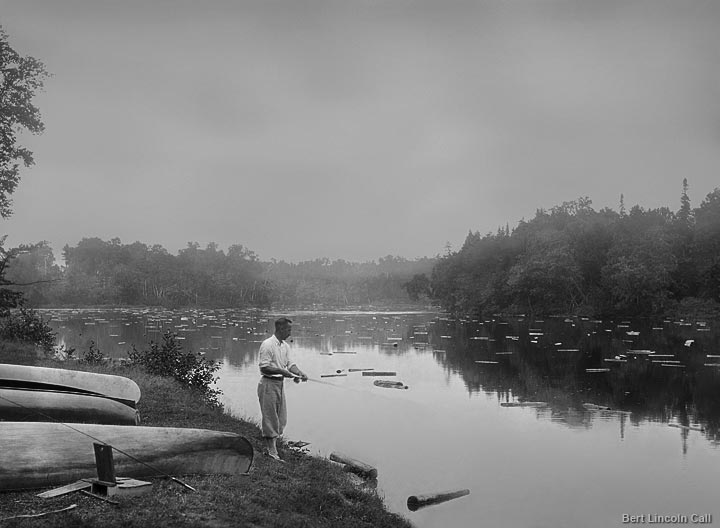 Man fishing on shore by Bert Lincoln Call