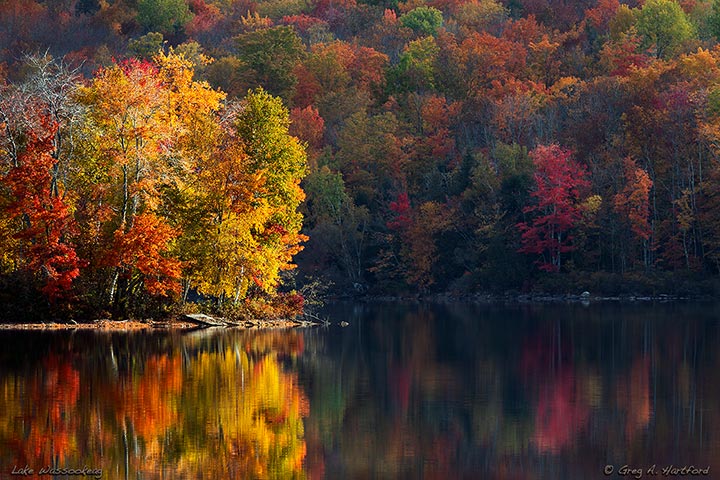 Beautiful autumn colors of October at Lake Wassookeag in Dexter, Maine